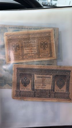 Collection of vintage 100 + paper money world