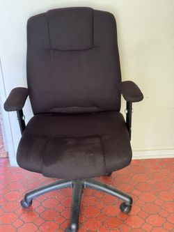 Office chair mesh fabric shows some wear