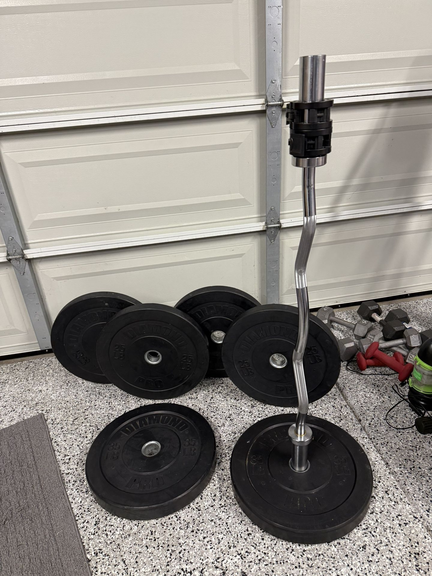 170lbs bumper Plates, Curl Bar And Clamps