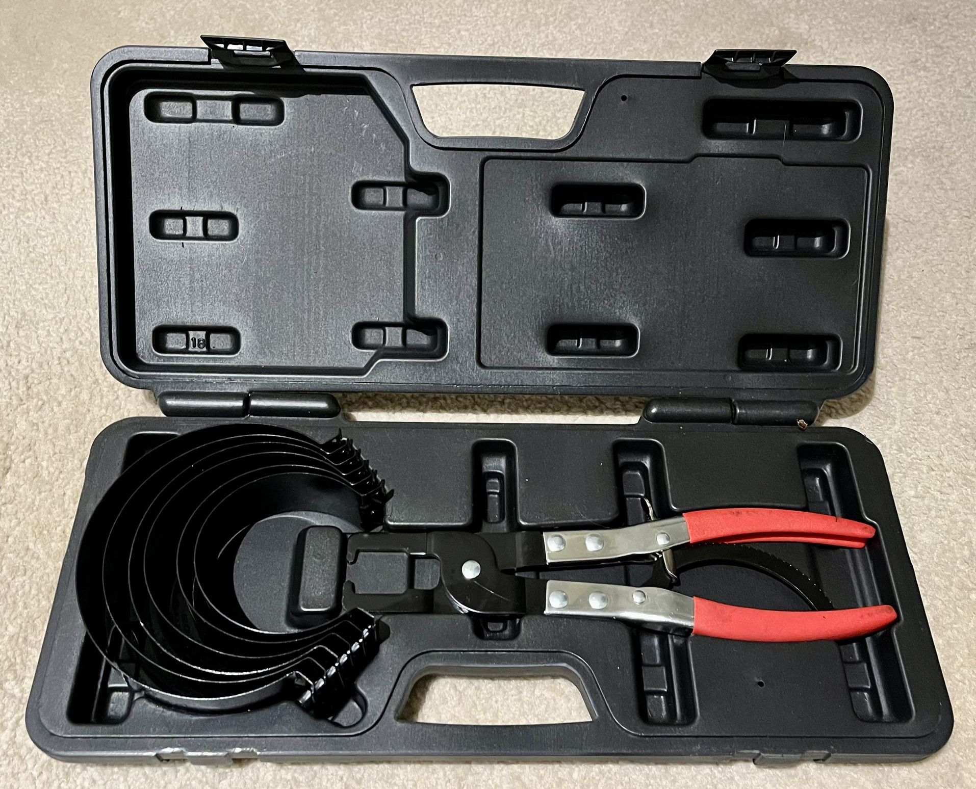 Piston ring compressor set with storage case