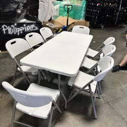 (50) White Event Chairs and (6) 6’ table