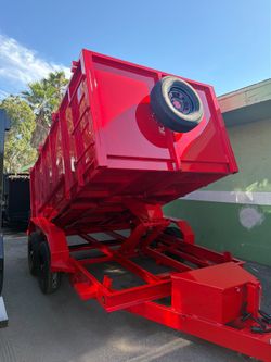 Scissor lift dump trailer