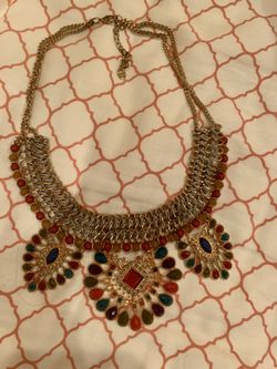 Multiple necklaces.