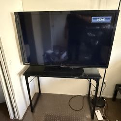 55” Inch LED  TV & Desk Included 100 OBO 