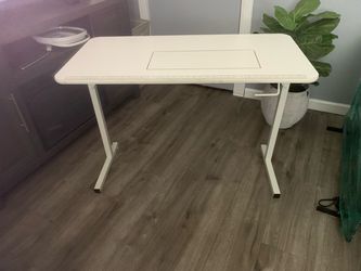 Sewing table for sewing machine