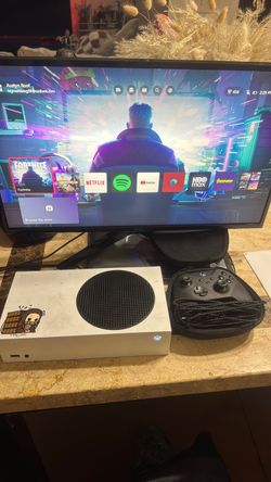 Xbox with controller and monitor