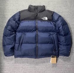 The North Face blue puffer jacket 
