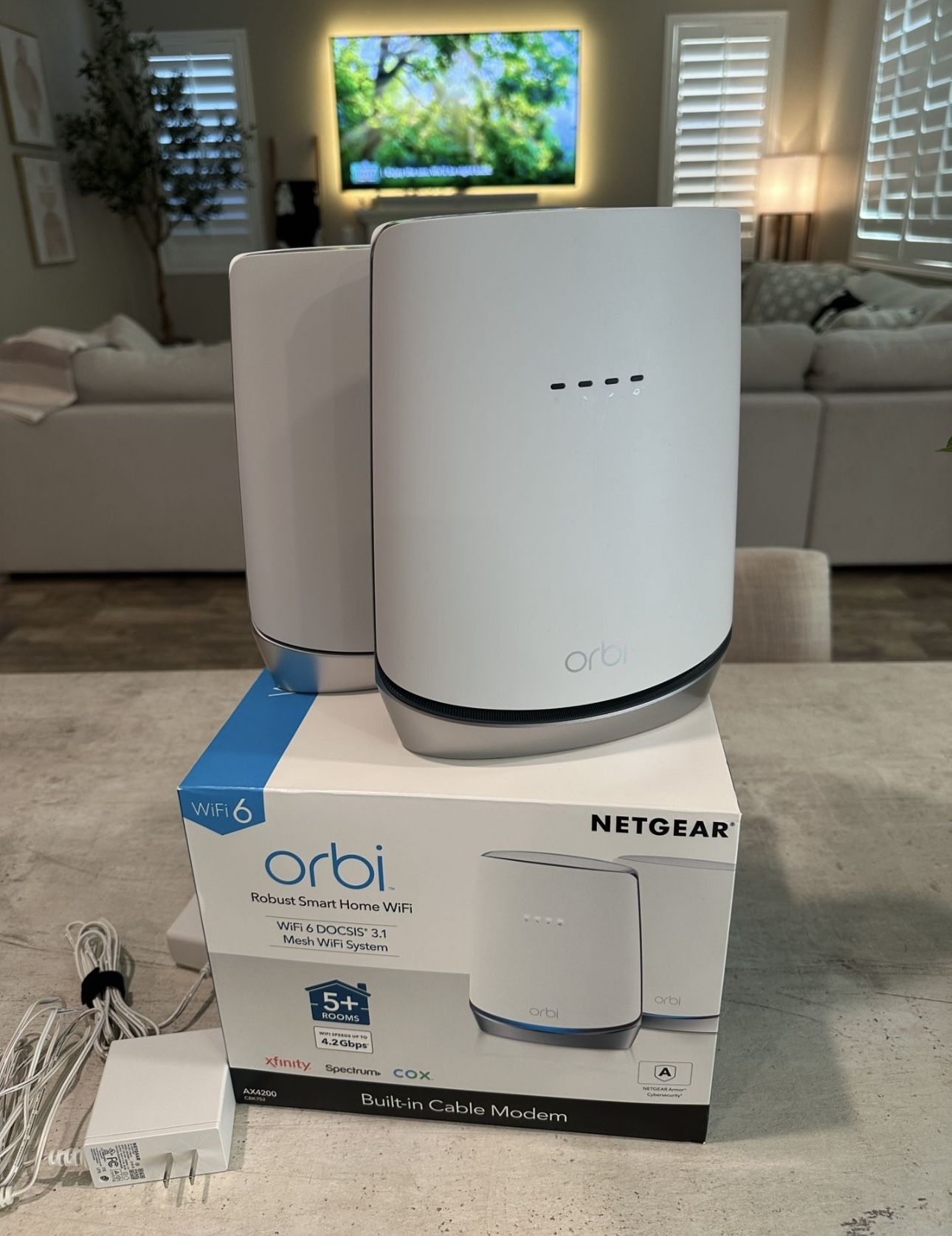 NETGEAR Orbi WiFi 6 Cable Modem Router + Satellite Extender, AX4200, Covers 5000 sq. ft., 40+ Device