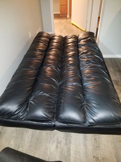 Black futon leather like no rips no stains