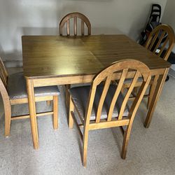Wooden dining table with 4 chairs. Great conditions