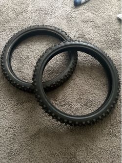 2 CST tires fitted for a Surron
