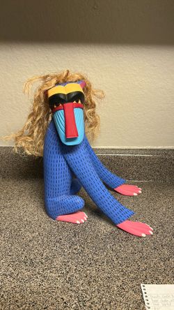 Ariel Playas:  Baboon Wood Carving
