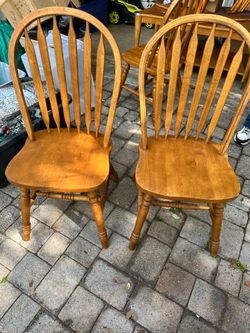 2 oak chairs made in Malaysia