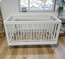 2 White standard crib $60 ea,mattress $25 