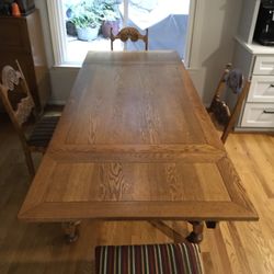 Golden Oak Dining Table And Chairs