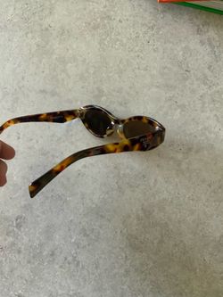 Brown designed Prada sunglasses
