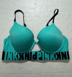 Pre Owned Good Last Photo Spot I have not tried to remove spot. Might be bleach. Victoria’s Secret PINK  Sports Bra  Turquoise Green  Women  Size 34C