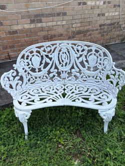 Wrought iron loveseat and 2-wrought iron chairs