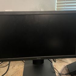 Two Computer Monitors With All The Cords
