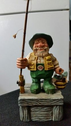 Wind up musical fisherman