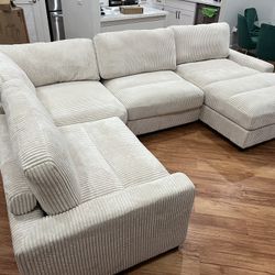 New 4 Piece Modular Sectional.  Off White/Beige Corduroy Fabric.  90”x127”x66”.  Free Delivery!