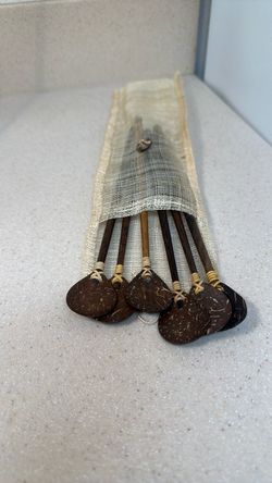Set of six Coconut Shell hand made spoons in woven bag