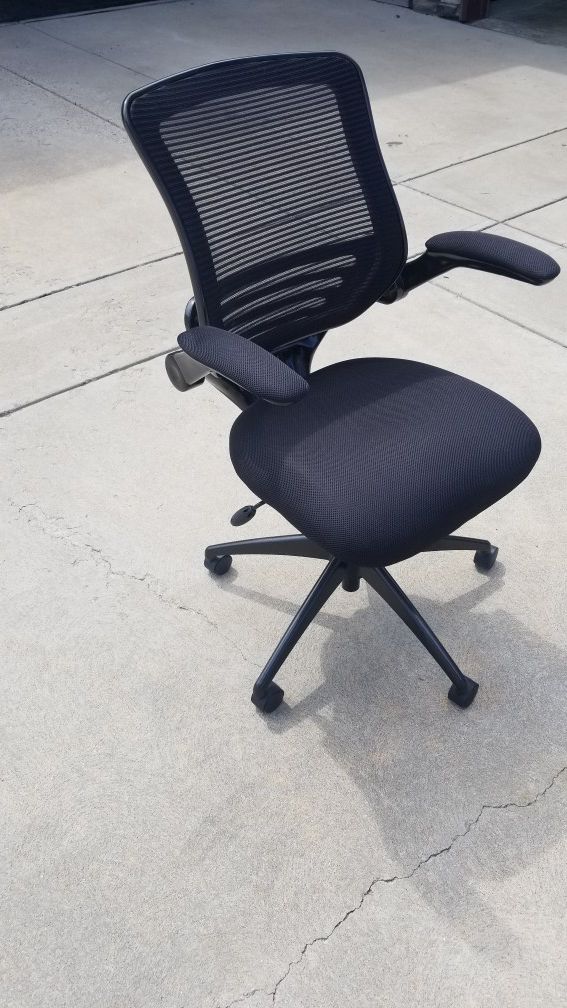 Almost new 6 way adjustable desk chair.