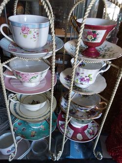 8 cups and saucers no stands included