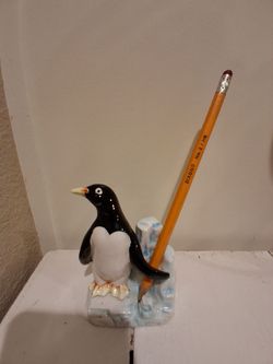 Vintage penguin pencil holder