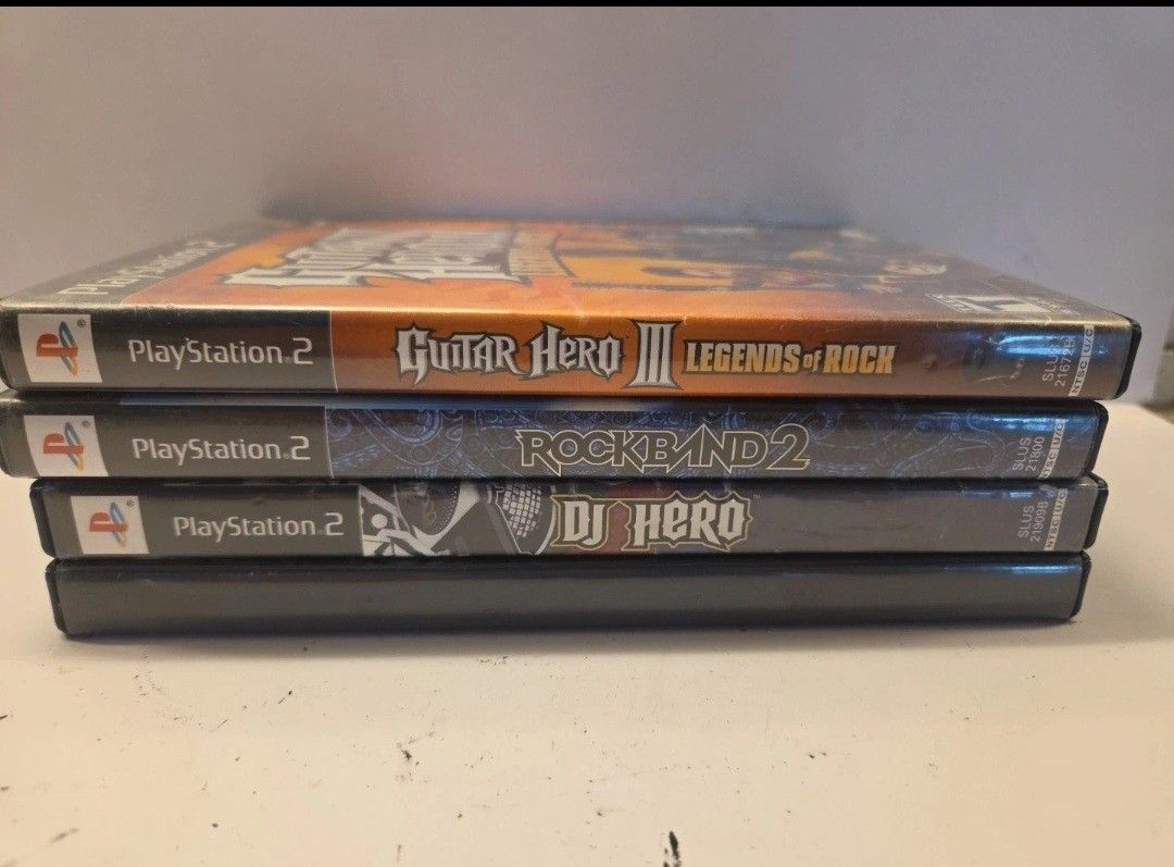 Lot of 4 Playstation Guitar Hero World Tour, Legends Of Rock Rock Band 2 DJ Hero