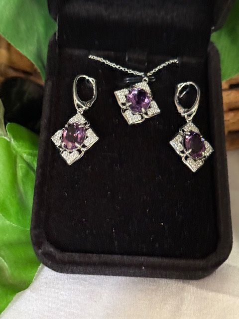 New, Custom Made, Sterling Silver Pendant and matching earrings with CZ’s and each piece hosting a 9x11mm amethyst. On SS 18” chain