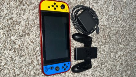 Nintendo Switch with Joy-Con Grip and Charger
