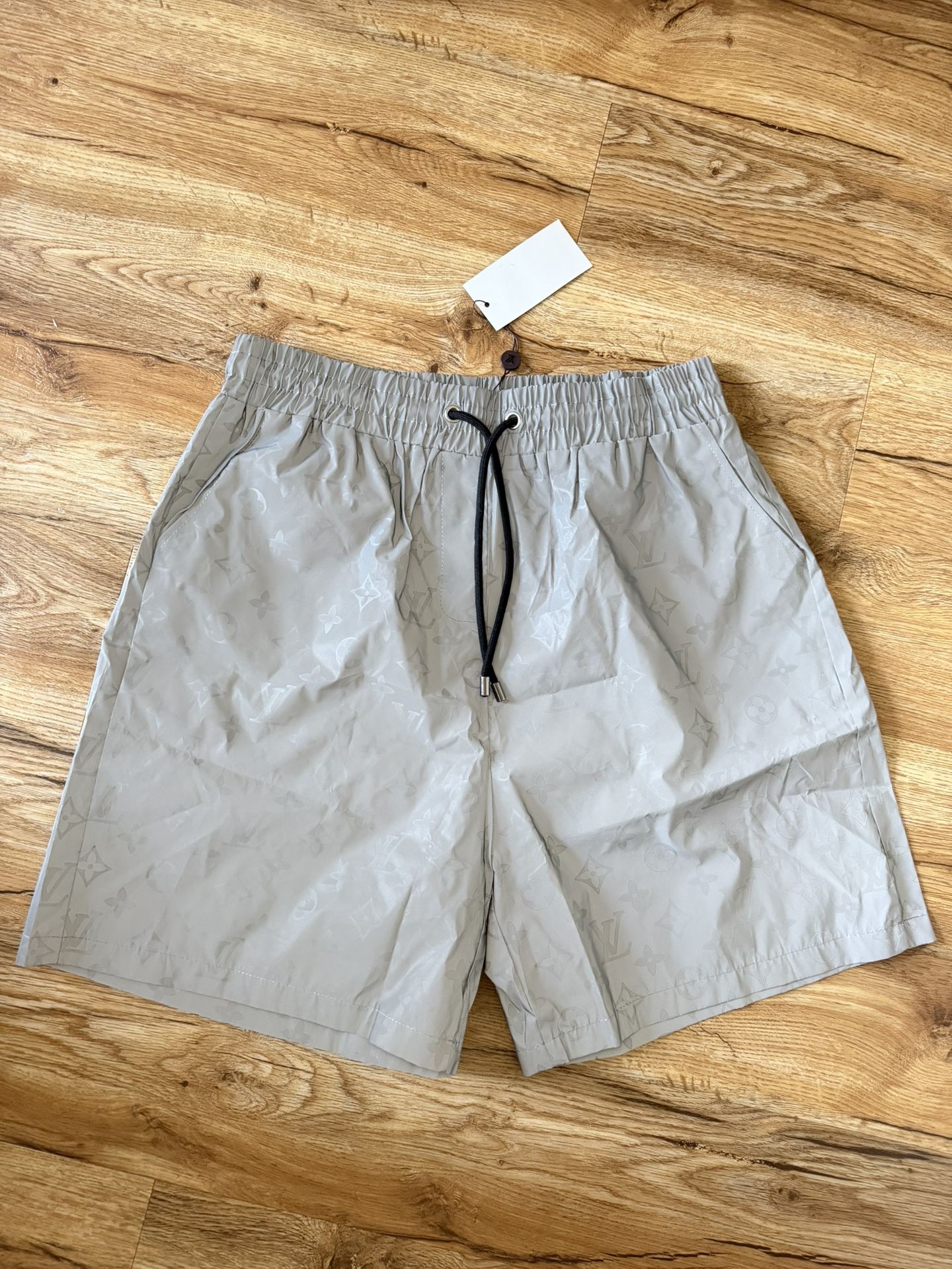 LV swim short for men  Brand new with tag Color gray USA men size Large