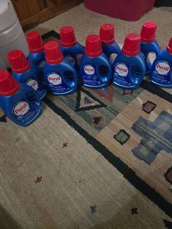 10 Bottles of Persil Liquid Laundry Detergents