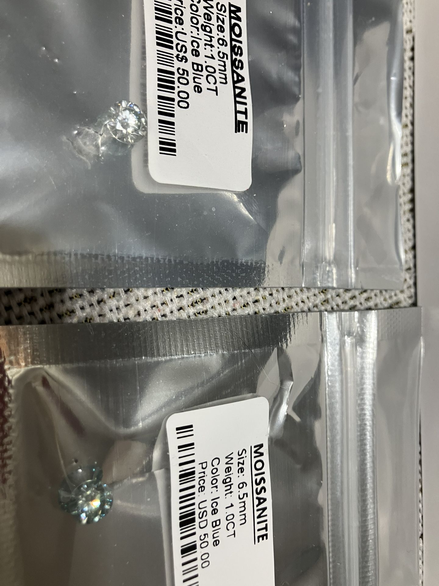 2 Stones, Moissanite And Blue Moissanite, One Karat Each