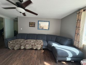 Huge couch with two recliners. Please see pictures.