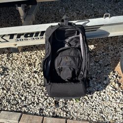 Carry On Luggage.   With Backpack Straps 