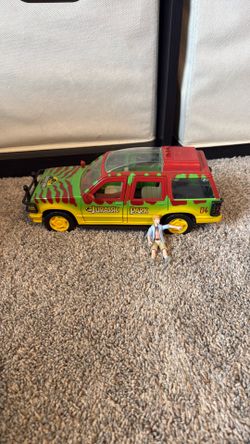 Jurassic Park toy car and kid