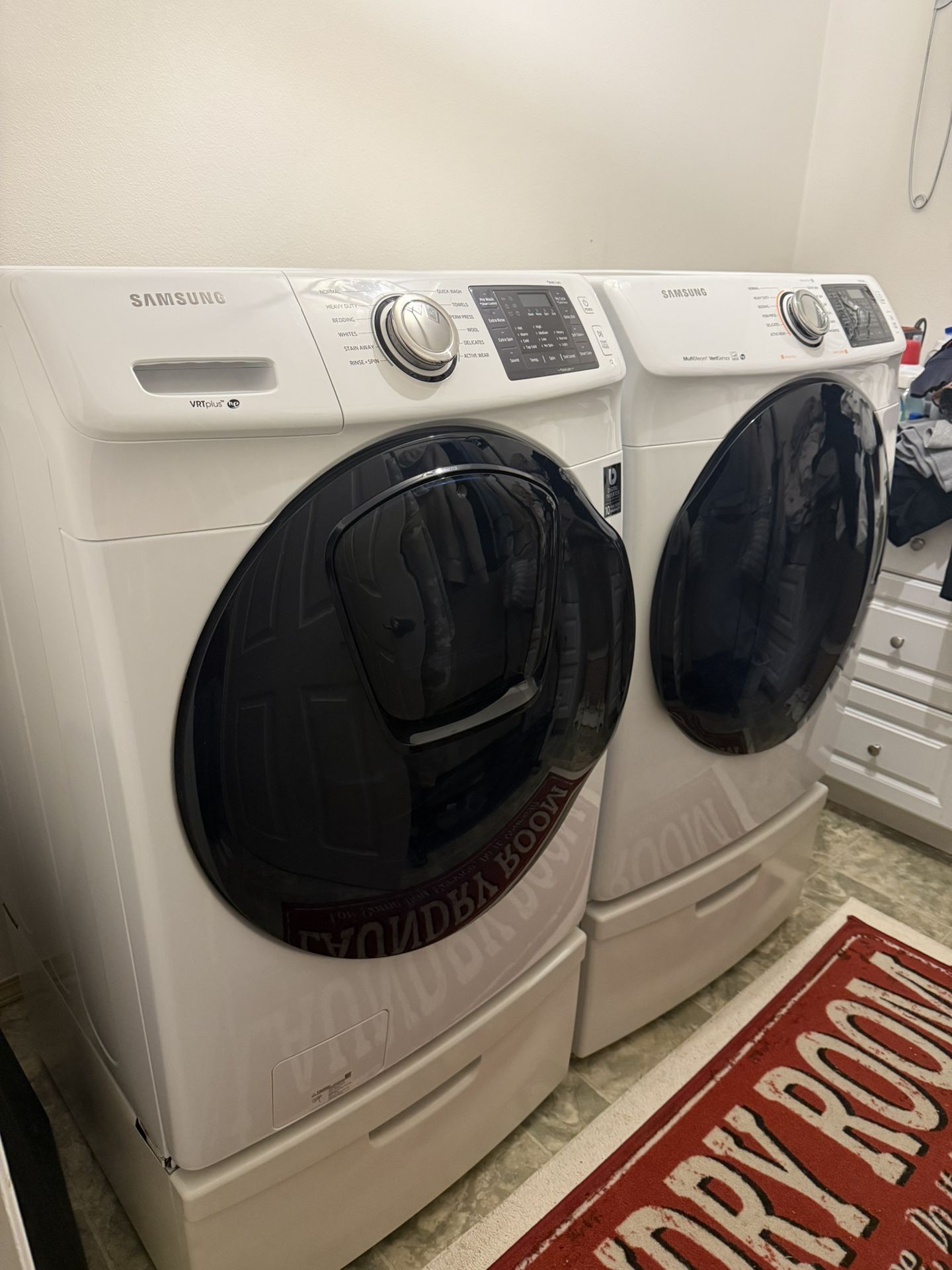 Samsung Front Load Washer and Electric Dryer Set with Pedestals 
