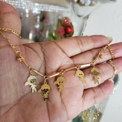 LINDOS NIÑITOS BAÑADA EN ORO LAMINADO GARANTIZADO. 4 NIÑITOS 1 NIÑA 