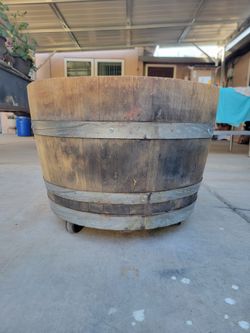 Half wine barrel w/wheels