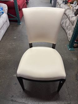 Set of 7 leather Nancy Corzine dining chairs