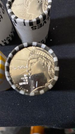 1(contact info removed) Rolls of Half Dollar Coins