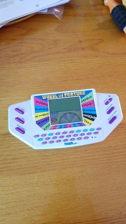 Wheel of Fortunehand held game by Tiger