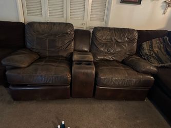 Double  reclining  brown love seat  with console - O.B.O