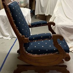 Hand carved wooden upholstered rocking chair. High end vintage antique. Really nice