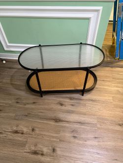 Oval Glass and Rattan Coffee Table