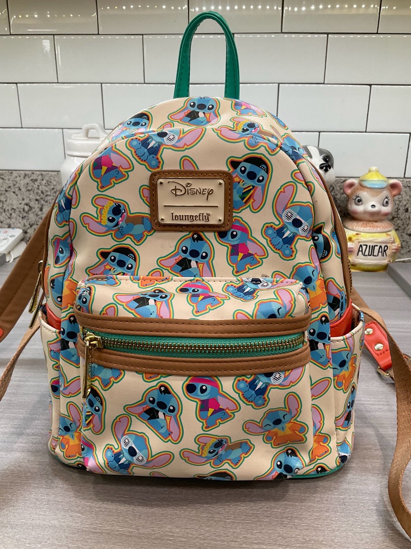 LOUNGEFLY DISNEY LILO & STITCH DECADE OUTFITS MINI BACKPACK
