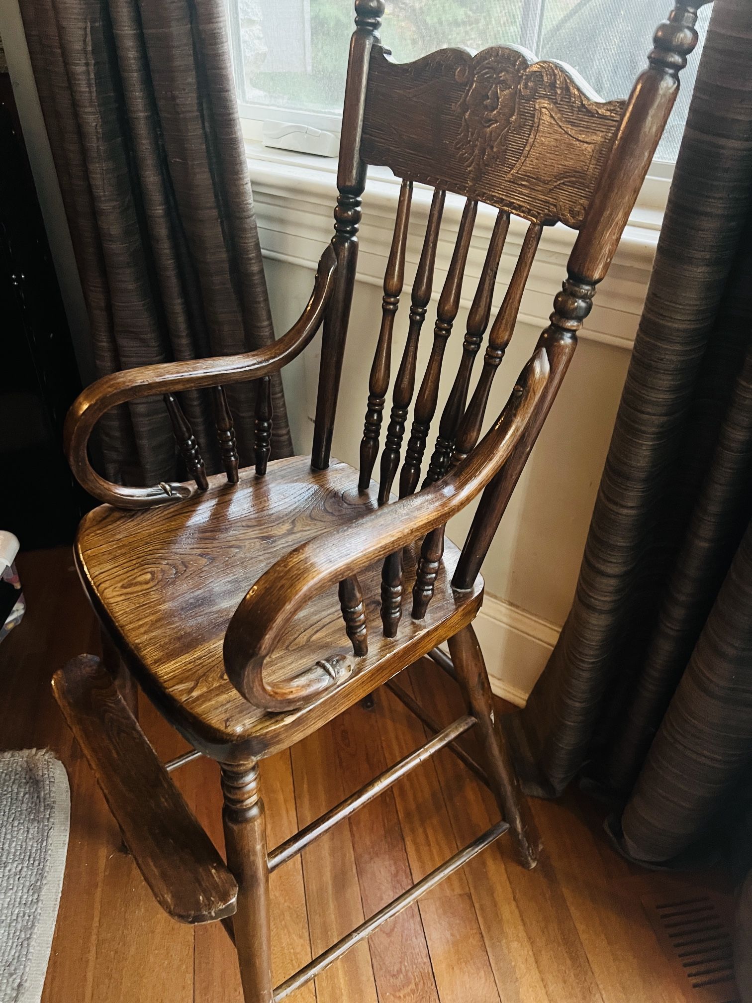 Antique high chair and antique doll bed