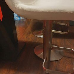  3 white faux leather adjustable bar stools